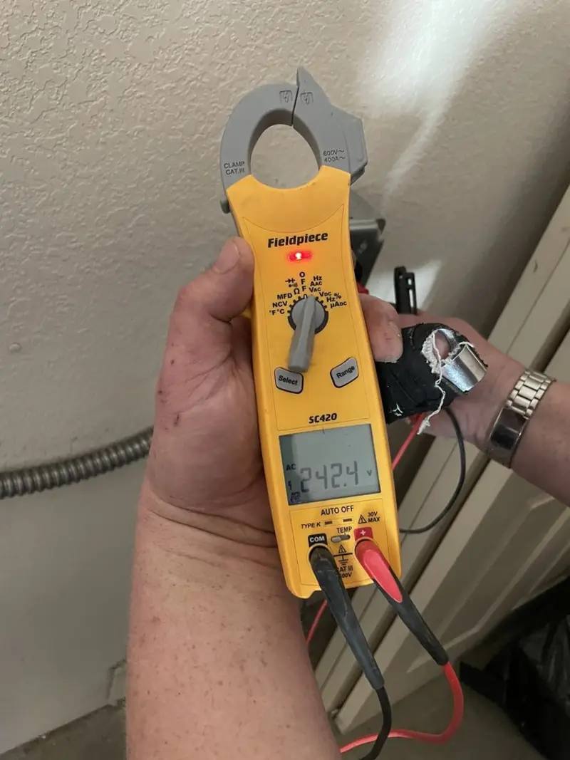 Voltage testing with clamp meter during Generator Installation in Haring